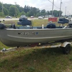 14ft. aluminum Sea Nymph fishing boat, 25hp Evinrude outboard, and trailer