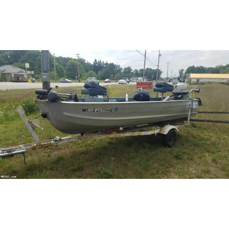 14ft. aluminum Sea Nymph fishing boat, 25hp Evinrude outboard, and trailer